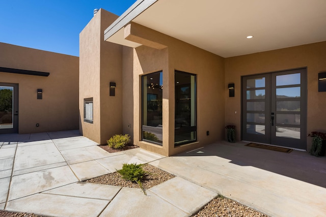 exterior space featuring french doors and a patio area