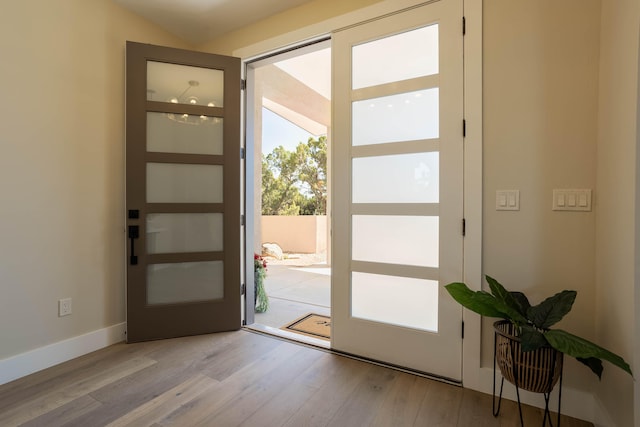 foyer with light wood-type flooring