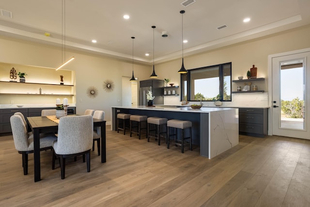 dining space featuring light hardwood / wood-style floors