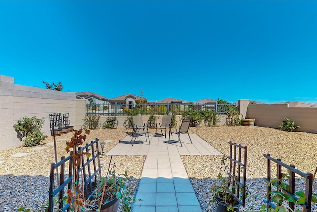 surrounding community with a patio