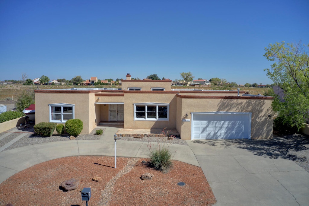 view of front of property featuring a garage