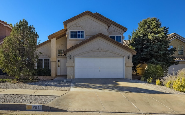 view of front of home with a garage