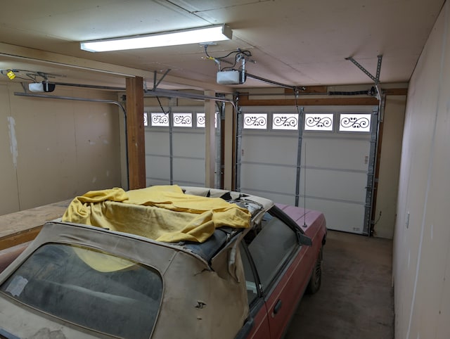 garage featuring a garage door opener