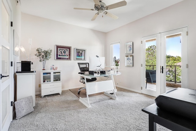 carpeted office space with french doors, baseboards, and ceiling fan