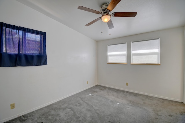 empty room with carpet and ceiling fan