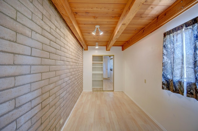 corridor featuring beamed ceiling, wood ceiling, and light hardwood / wood-style flooring