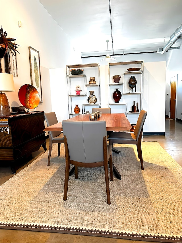 dining room with wood-type flooring