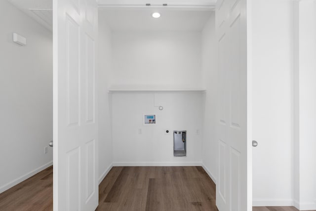 washroom featuring washer hookup, laundry area, wood finished floors, and gas dryer hookup