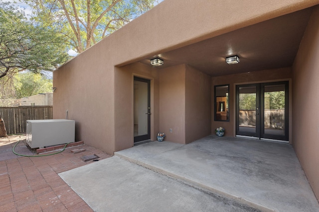 2616 Don Pedro NW, Albuquerque, NM 87104 - view of patio with french doors and fence
