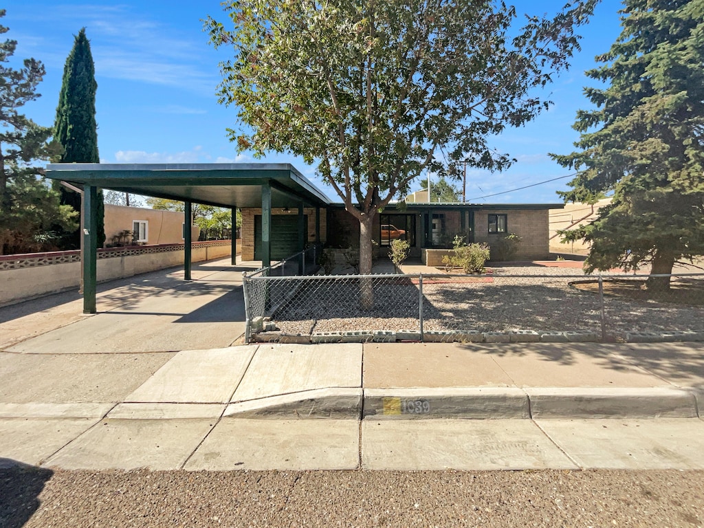 view of front of house with a carport