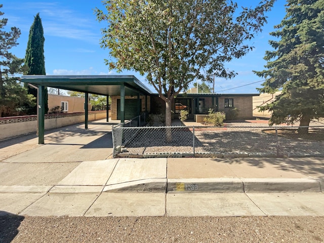 view of front of house with a carport