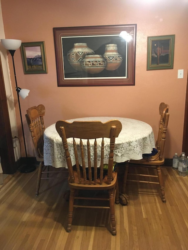 dining room featuring wood-type flooring