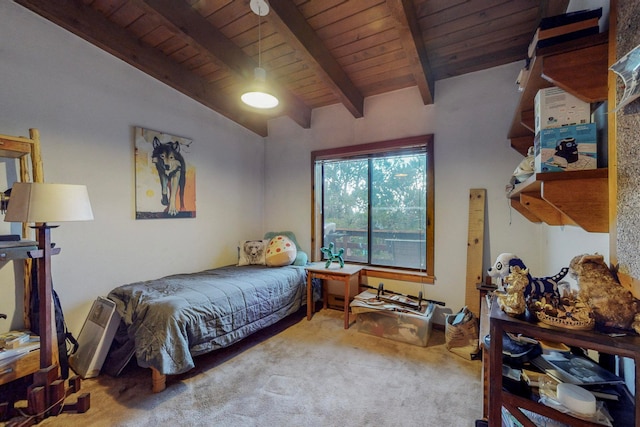 bedroom featuring vaulted ceiling with beams, carpet, and wooden ceiling