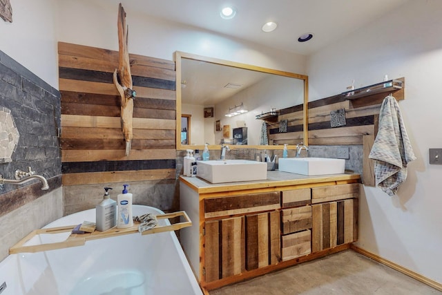 bathroom featuring concrete floors and vanity