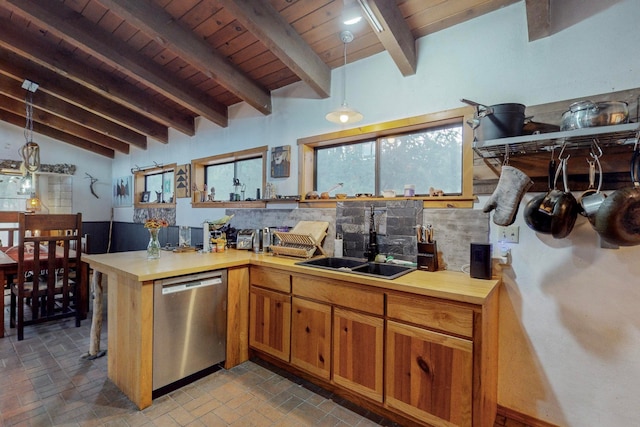 kitchen with vaulted ceiling with beams, dishwasher, hanging light fixtures, and sink