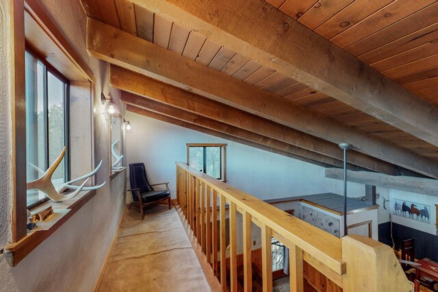 hallway with vaulted ceiling with beams and wooden ceiling