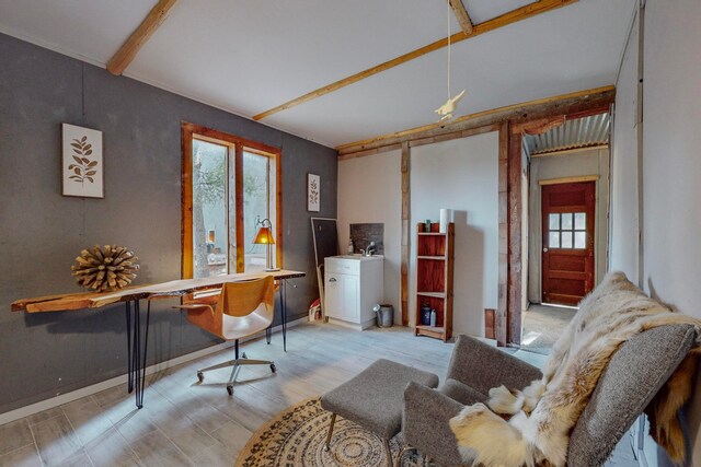 office with beamed ceiling and light hardwood / wood-style flooring