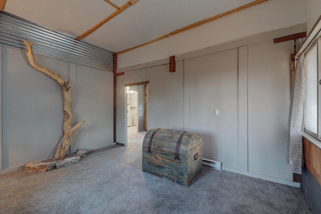 living area with a baseboard radiator and carpet floors