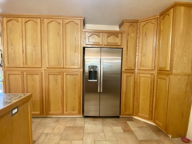 kitchen with stainless steel fridge