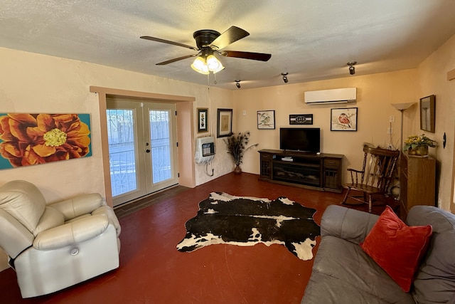 living room with a textured ceiling, french doors, a wall unit AC, ceiling fan, and heating unit