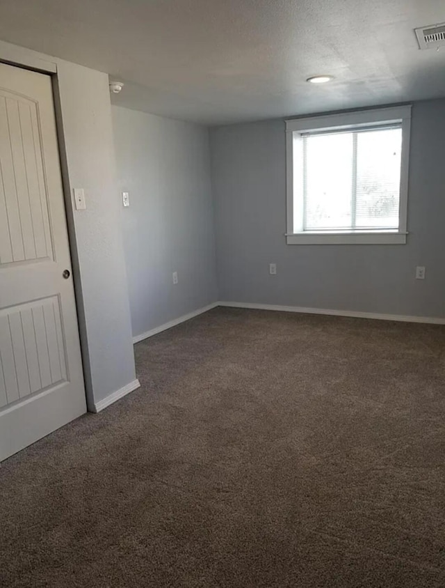 view of carpeted spare room