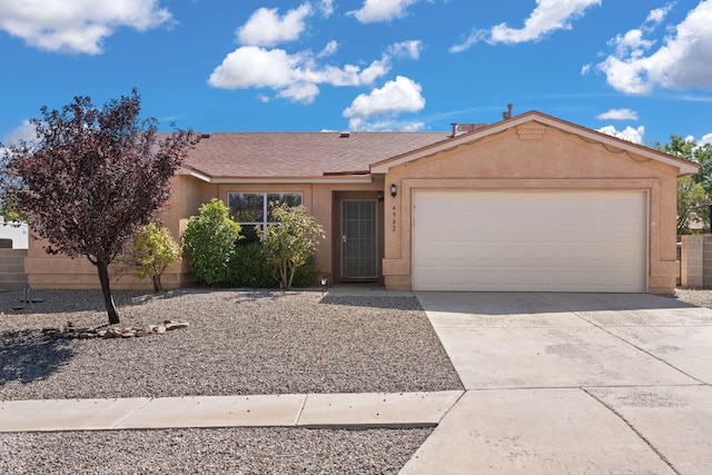 ranch-style home with a garage