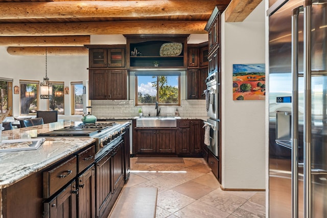 kitchen with beamed ceiling, decorative backsplash, stainless steel appliances, dark brown cabinetry, and light stone countertops