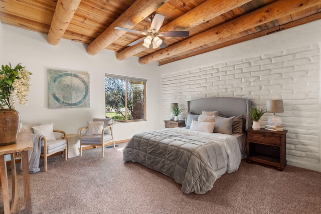 carpeted bedroom featuring wood ceiling, ceiling fan, beamed ceiling, and brick wall