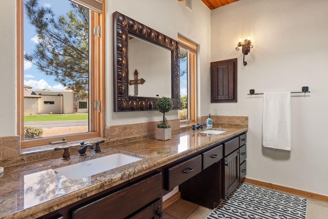 bathroom featuring vanity and tile patterned floors