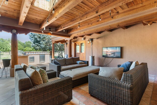 view of patio featuring an outdoor hangout area and exterior kitchen