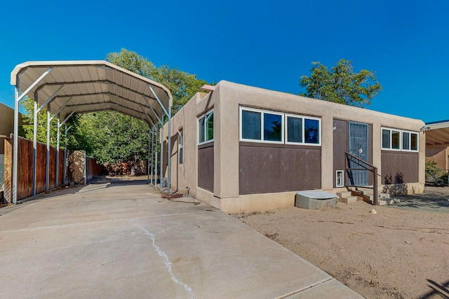 view of front facade with a carport