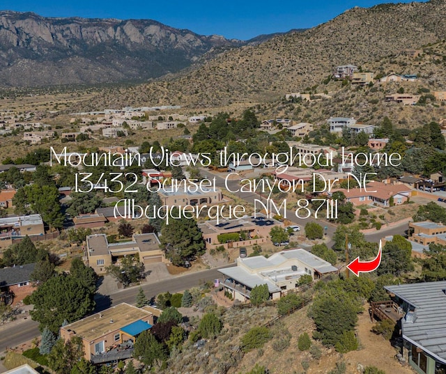 bird's eye view with a mountain view