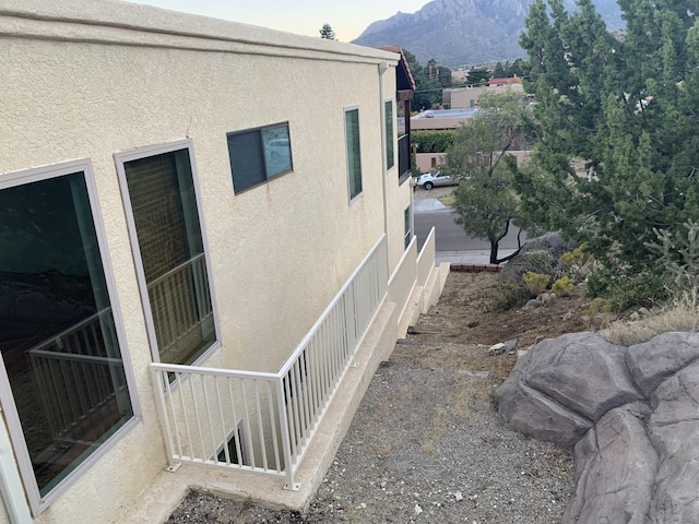 view of home's exterior with a mountain view