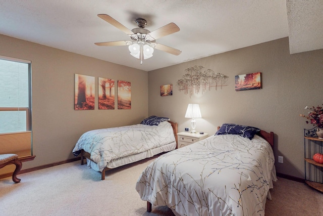 bedroom featuring ceiling fan and carpet flooring