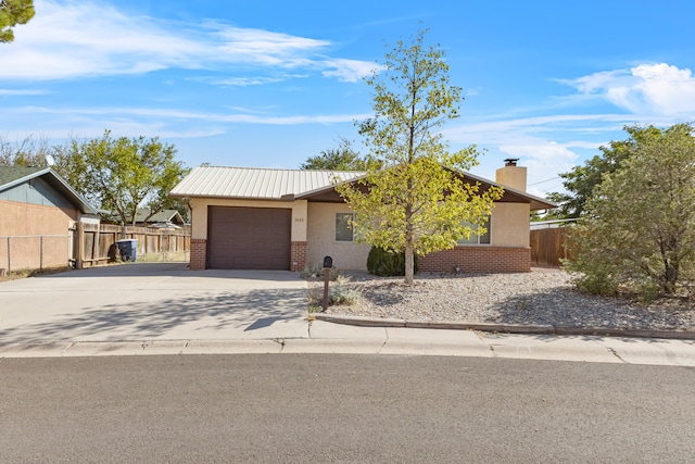 single story home with a garage