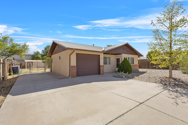 ranch-style home with a garage