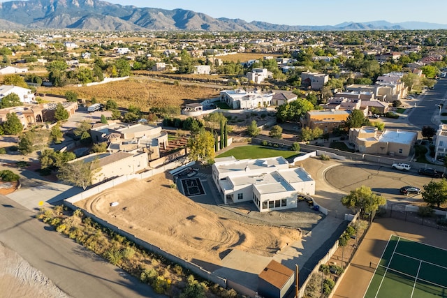 drone / aerial view with a residential view and a mountain view