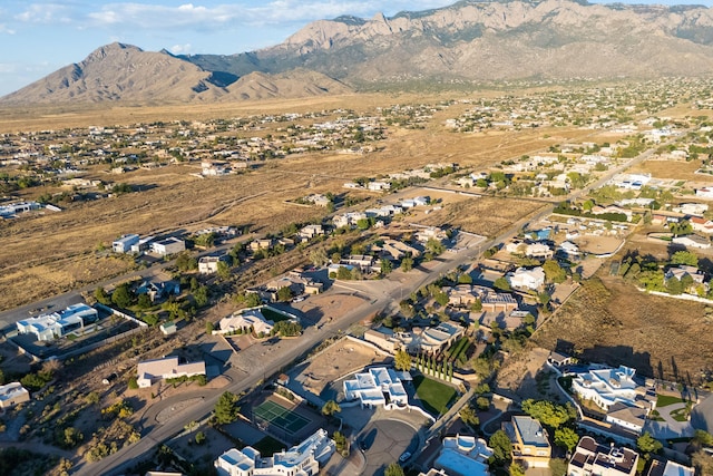 drone / aerial view featuring a residential view and a mountain view