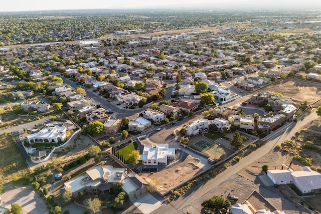 birds eye view of property with a residential view