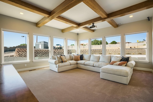 sunroom with coffered ceiling, beam ceiling, and a healthy amount of sunlight