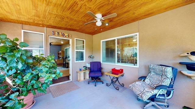 view of patio featuring ceiling fan