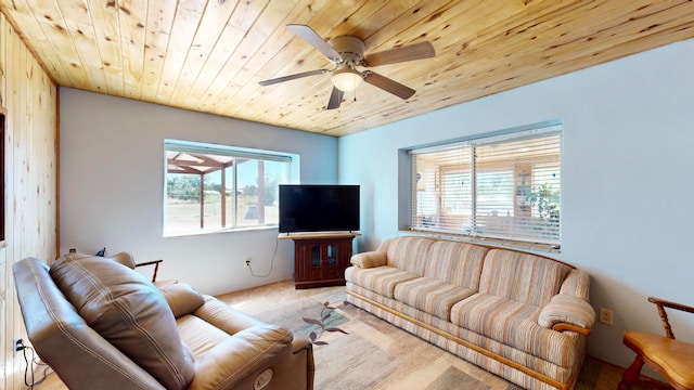 living room featuring wood ceiling and ceiling fan