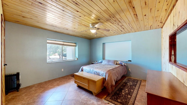 tiled bedroom with ceiling fan and wood ceiling