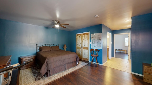 bedroom featuring ceiling fan and hardwood / wood-style floors