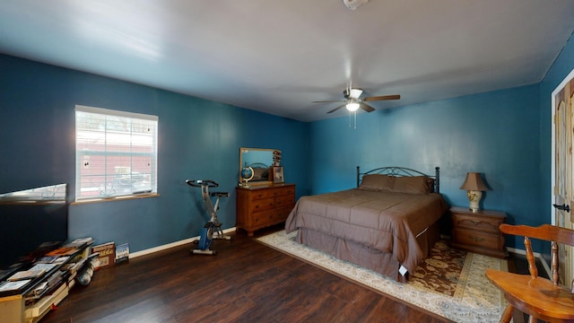 bedroom featuring dark wood-type flooring and ceiling fan