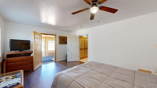 bedroom featuring dark hardwood / wood-style flooring and ceiling fan