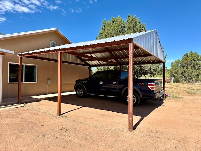 view of car parking featuring a carport