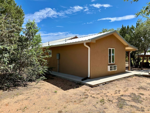 view of home's exterior with a deck