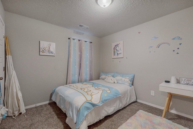 carpeted bedroom with a textured ceiling