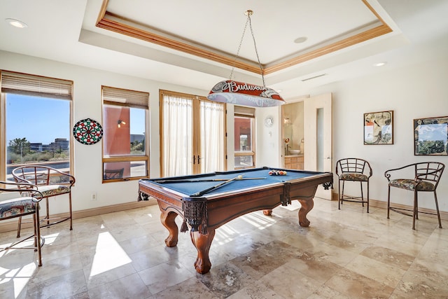 rec room with pool table, crown molding, and a tray ceiling